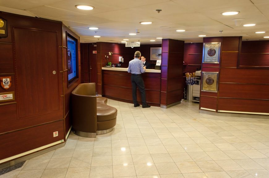 The Reception Area onboard Silver Explorer, Deck 3, facing starboard. Photo © 2015 Aaron Saunders