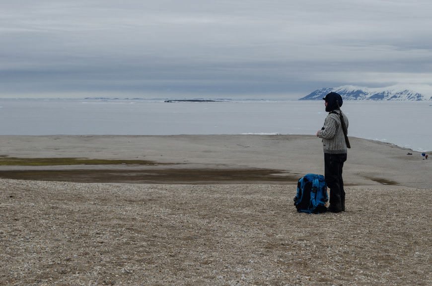 Polar Bear Guard and Expedition Team Member Chris on watch. Photo © 2015 Aaron Saunders