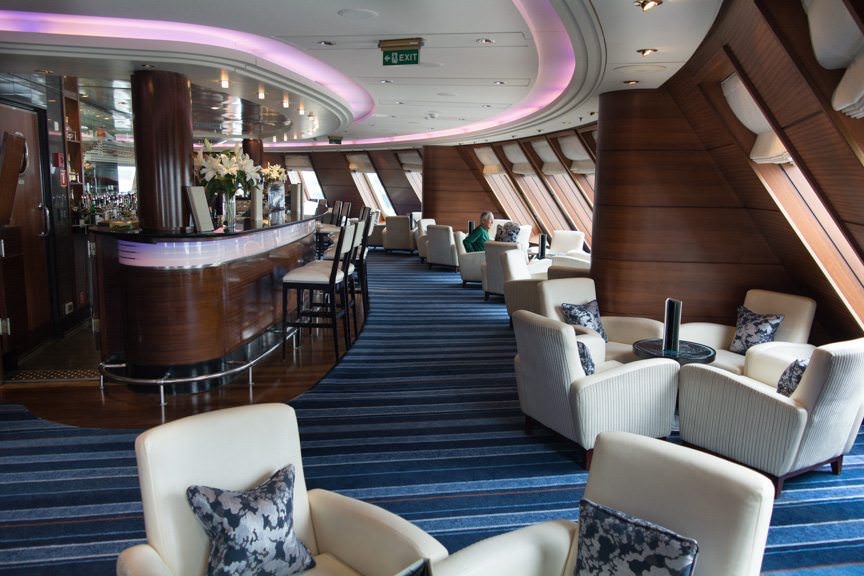 One of my all-time favorite spots onboard: the Commodore Club, Deck 9 forward. Photo © 2015 Aaron Saunders