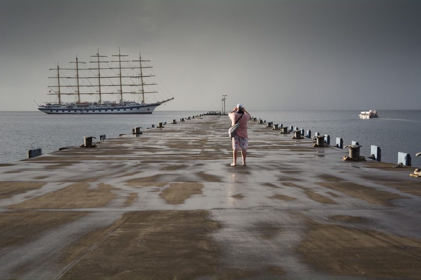 Royal Clipper at anchor off St. George's, Grenada on a stormy afternoon. Photo © 2015 Aaron Saunders