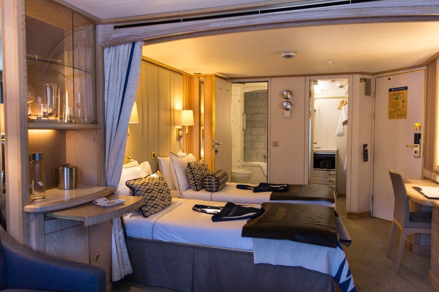 The reverse angle: looking back towards the bathroom, closet and entry door in S3 Oceanview Suite 303, starboard side, forward. Photo © 2016 Aaron Saunders